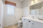 Bright bathroom with tub and stand up shower 